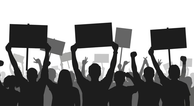 People holding protest signs in crowd.