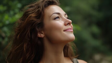 Fototapeta premium A serene portrait capturing a woman s moment of contemplation and joyful reflection surrounded by lush natural greenery