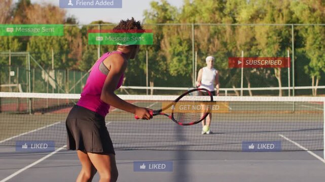 Far-side tossing tennis ball, near-side hitting forehand to return shot, social alerts appearing