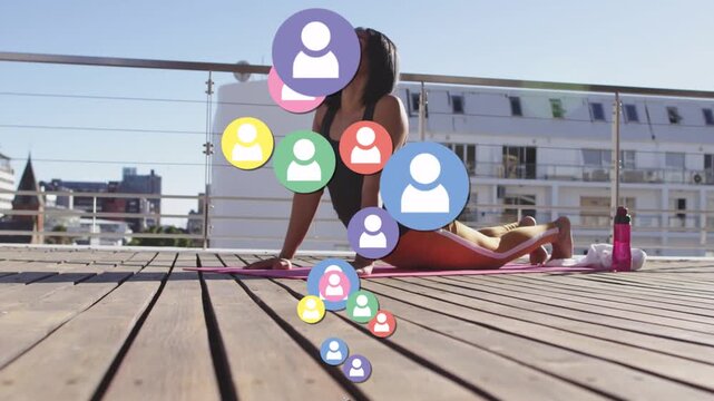 Woman performing backbend on pink mat avatars appearing growing, rising, obscuring torso for yoga
