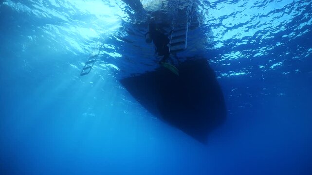 boat scenery underwater scuba divers around ocean scenery