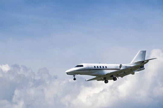 Geneva, Switzerland - April 06, 2026: sign and logo on a Cessna Citation Latitude of NetJets landing at Geneva airport