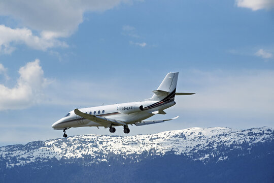 Geneva, Switzerland - April 06, 2026: sign and logo on a Cessna Citation Latitude of NetJets landing at Geneva airport