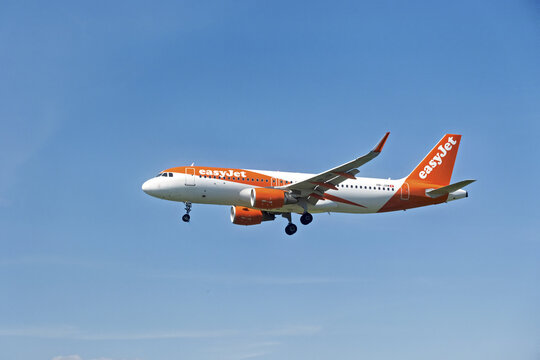 Geneva, Switzerland - april 07, 2026 :  sign and logo on a Airbus A320-214 of Easyjet landing at Geneva airport