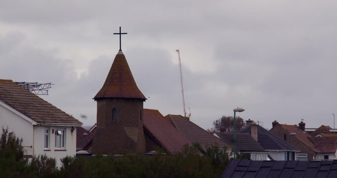 Long shot of the Church of the Good Shepherd, from Shoreham beach.