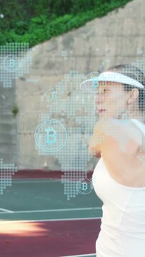 Woman tracking ball, executing twohanded backhand to return, tennis overlay maps B icons on racket
