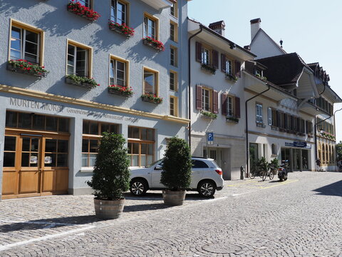 Frontage with cobble road of old town of Murten in Switzerland