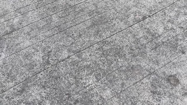 Close up of rough asphalt road surface texture