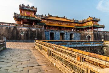 Naklejka premium A view across the bridge leading to the Noon Gate of the Imperial City in Hue, Vietnam in the early evening