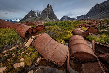 Tasiilaq, Sermersooq Municipality, Greenland Piles of rusting fuel drums of abandoned US WW2 base Bluie East Two, Ikateq, Greenland © magic photography 
