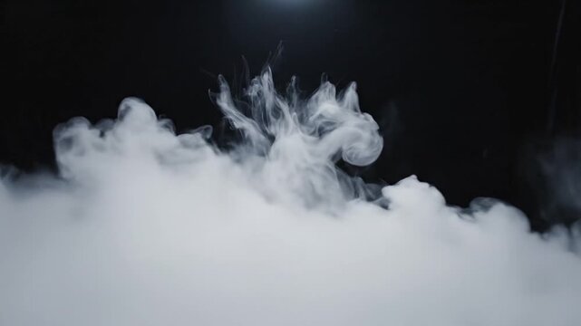 Smoke rising in the darkness.