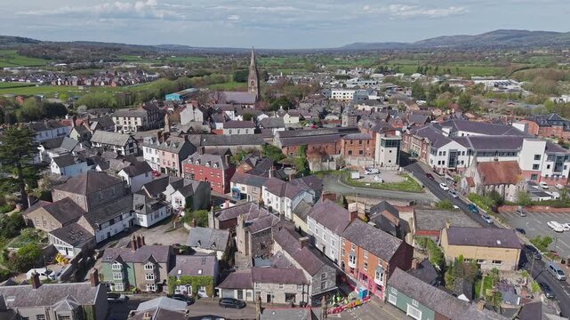 Aerial view of town centre of Ruthin featuring the St Peter's Church and the Town Hall set within the North Wales landscape