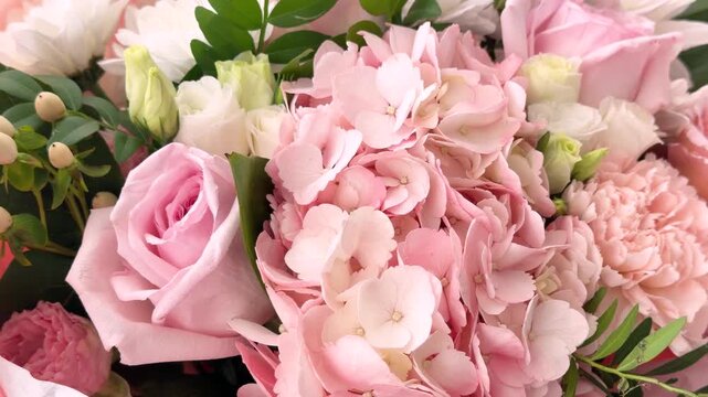 Pink roses and hydrangeas floral arrangement close up