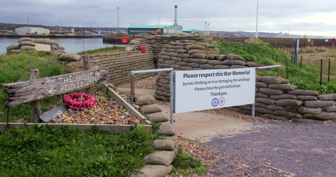 Wide shot of the entrance to a War Memorial set up as a World War One trench. At Shoreham Fort