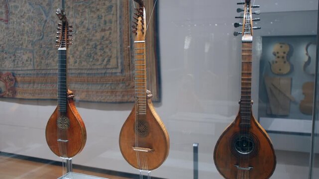 Vintage antique medieval lutes in a musium exhibition display from old England