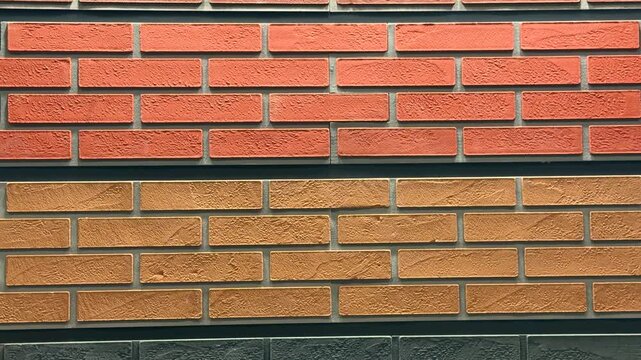 Rows of different colored bricks arranged in walls