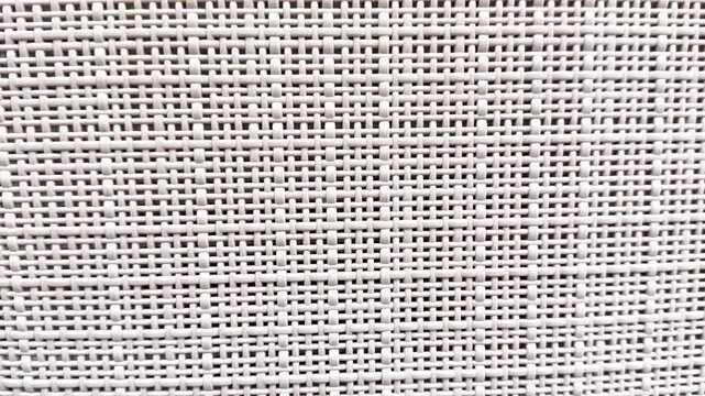Woven textured background with small grid pattern