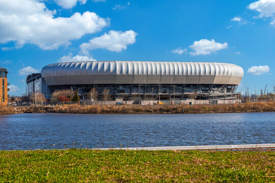 HARRISON, NEW JERSEY - APRIL 4, 2022: An external view of Red Bull Arena, a soccer-specific stadium, seen across the Passaic River 