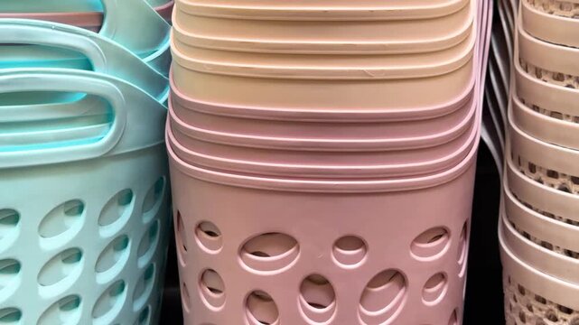 Stacked plastic storage containers with decorative holes