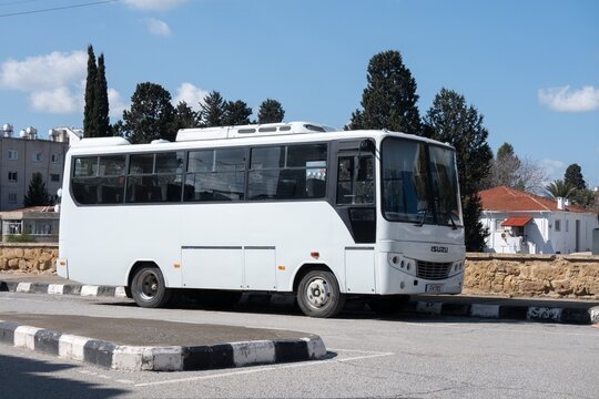 Small Anadolu Isuzu Turquoise (Turkuaz) bus parked in Cyprus