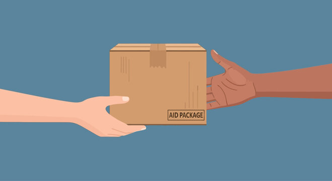 Handing over a cardboard box delivery package between two hands.