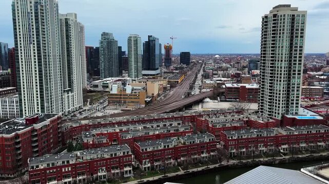 Aerial view of the West side of Chicago's downtown, with buildings and condos all along the Chicago River.