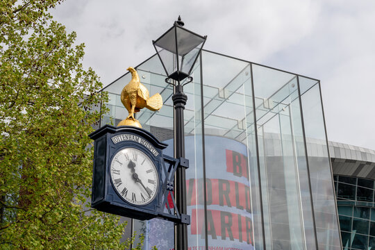 London. UK- April 17.2026. The Tottenham Hotspur Football Club crest of a cockerel perched on a football on a clock and street lamp by its stadium.