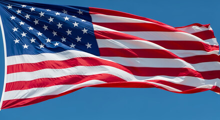 Obraz premium American flag waving in clear blue sky for Memorial Day, national symbol of freedom and sacrifice, US stars and stripes, patriotic veteran remembrance, Fourth of July celebration.