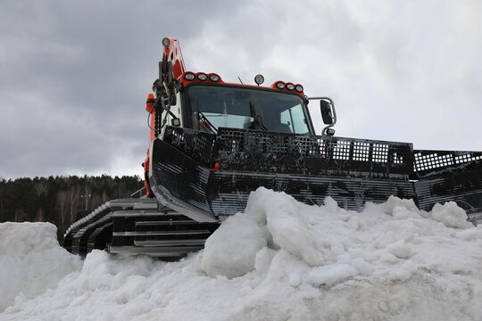 snowcat is a special tracked vehicle used for preparing ski slopes and ski trails
