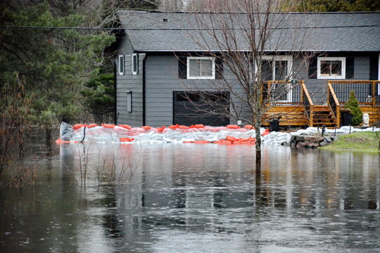 Flood waters along the Gull River threaten the village of Minden in the spring of 2026. 