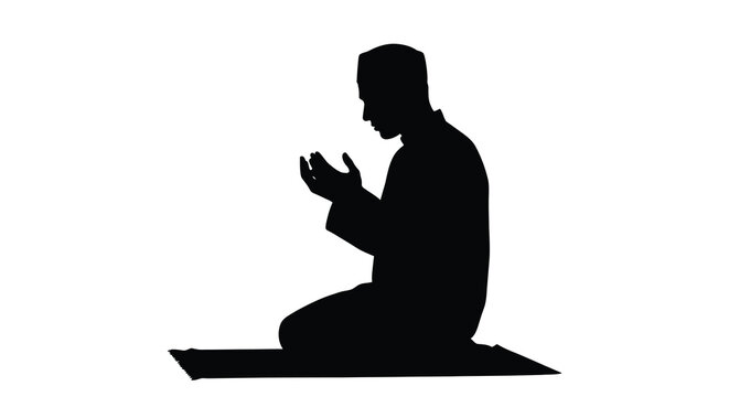 A man kneeling in prayer hands raised in supplication silhouette