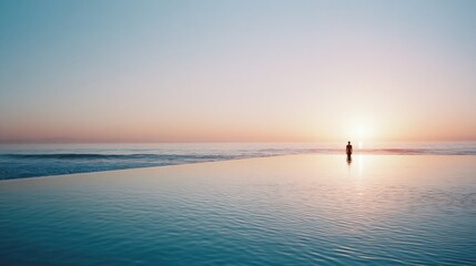 Obraz premium Woman standing in infinity pool overlooking ocean at sunset. Concept of peace, tranquility and luxury travel destination. Meditative moment at water edge during golden hour reflection.