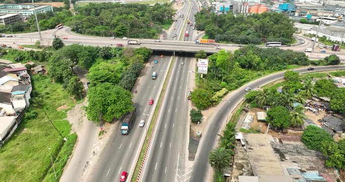 People Below, Cars in Motion, and a City Breathing Beneath the Ivorian Sun