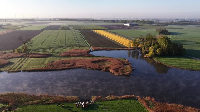 Netherlands polder landscape on a misty morning from above