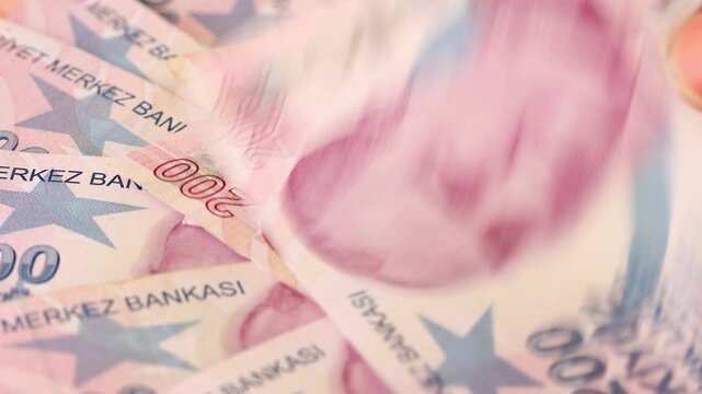 Turkey money rotating, Lot of 200 Turkish liras banknotes, Concept of financial success, big wins, profits and building capital. close up