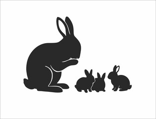 Black silhouette of a mother rabbit with three small bunnies on a white background, depicting a family scene. © Agus