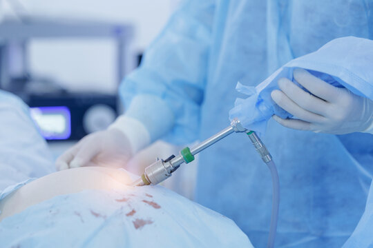Closeup Surgical insertion of laparoscopic instrument in operating room