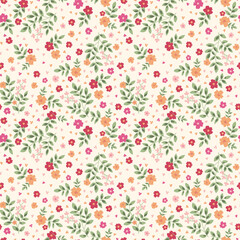 Fototapeta premium Delicate ditsy floral pattern with small red and orange blossoms on a cream background