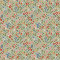 Delicate floral pattern with small blossoms on a muted green background © Creativezone