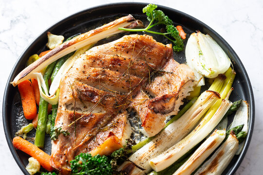 Oven-baked fish and vegetables