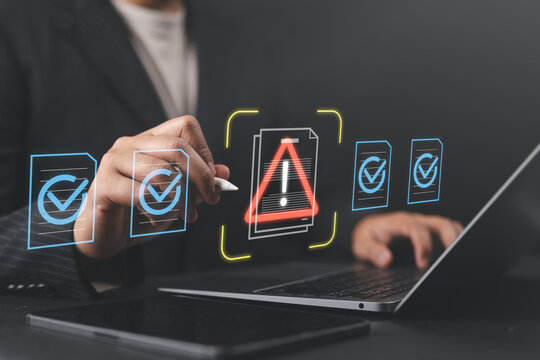 Problematic document and rejected file with error notification on approval system, featuring businessman using laptop to submit documents for compliance verification and review.