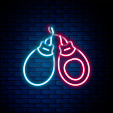 Glowing neon line Musical instrument castanets icon isolated on brick wall background. Colorful outline concept. Vector