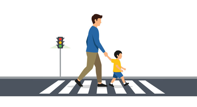 A father in a blue shirt and his young son in a yellow shirt walk across a zebra crossing while a green traffic light signals safety for pedestrians.