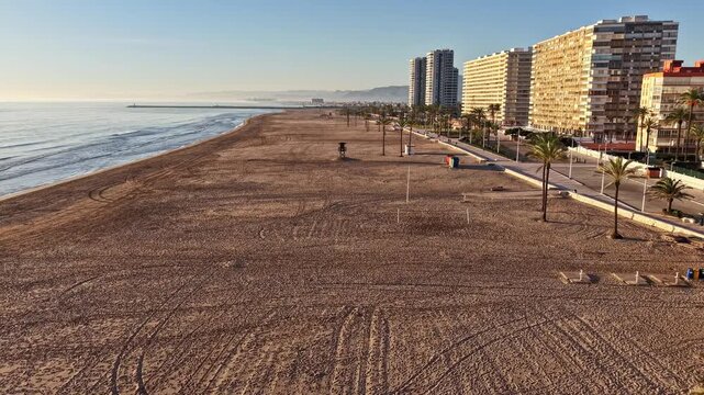 Aerial timelapse video frame of Cullera beach promenade and coastal skyline in morning light, Valencia, Spain