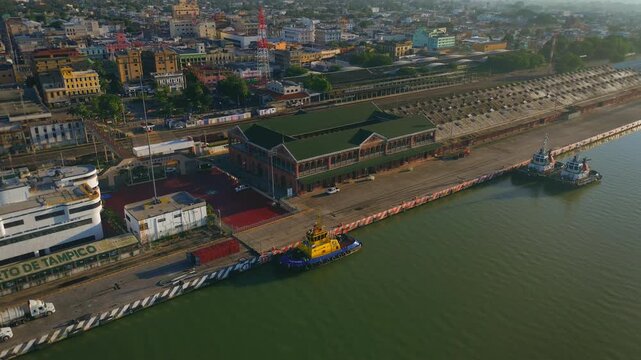 Cinematic Aerial Drone Traveling In Toward the Historic Old Customs Building and Museum of the Victory of Tampico During a Beautiful Morning Sunrise in the City Center of Tampico Tamaulipas Mexico