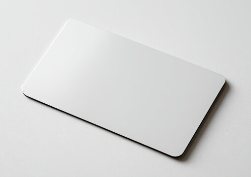 Plain white blank rectangle card with rounded corners on a white surface