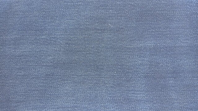 Blue denim fiber texture background