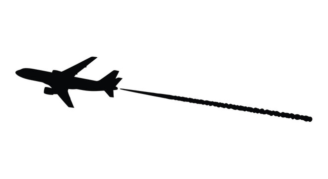 Silhouette of an airplane in flight leaving a long contrail behind