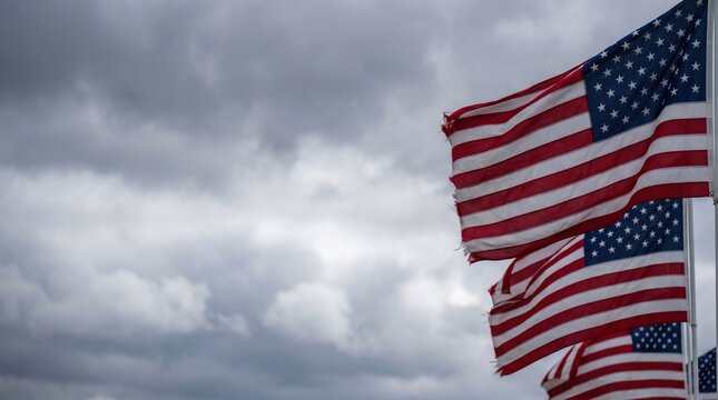 American flags waving in cloudy sky with united states stars and stripes national anthem national patriotism