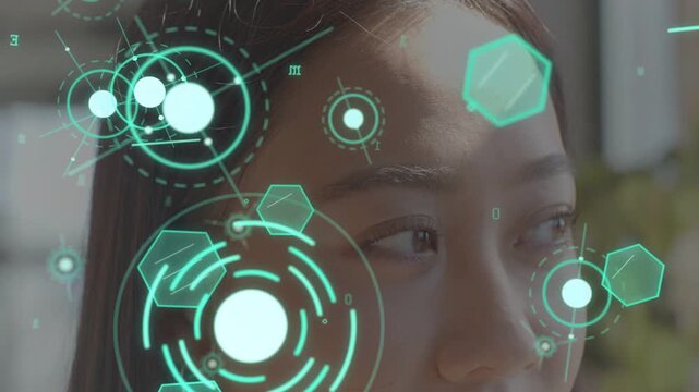 Woman observing HUD activating, rings and hex nodes rotating, revealing face for tech demo